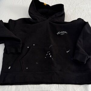 Yellow Label Co. sweatshirt.